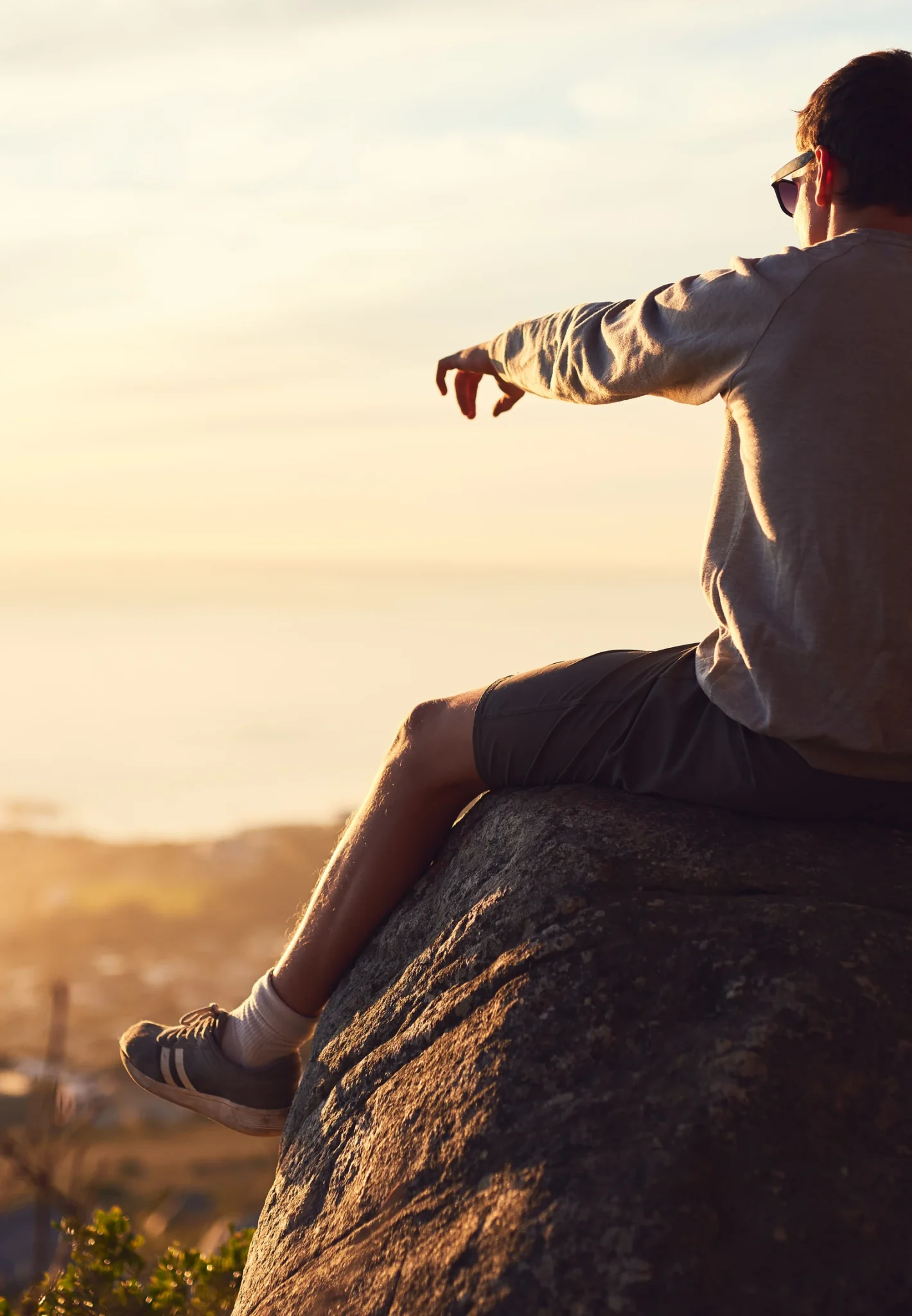 Couple enjoying beautiful sunset view from h