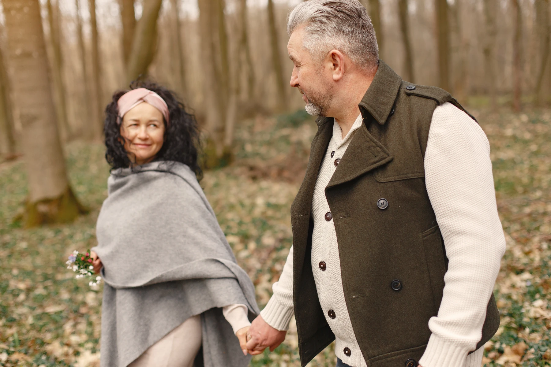 Elegant adult couple in a spring forest 2026